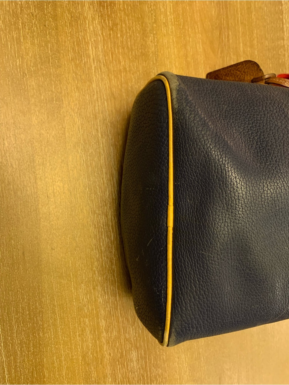 Dooney & Bourke Navy, Red & Yellow Leather Drawstring Bucket Bag - Picture 8 of 16